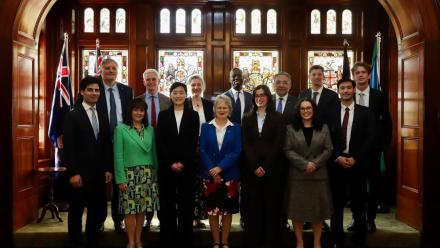 Chi Chi Zhao with group of people at Rhodes Scholarship announcement